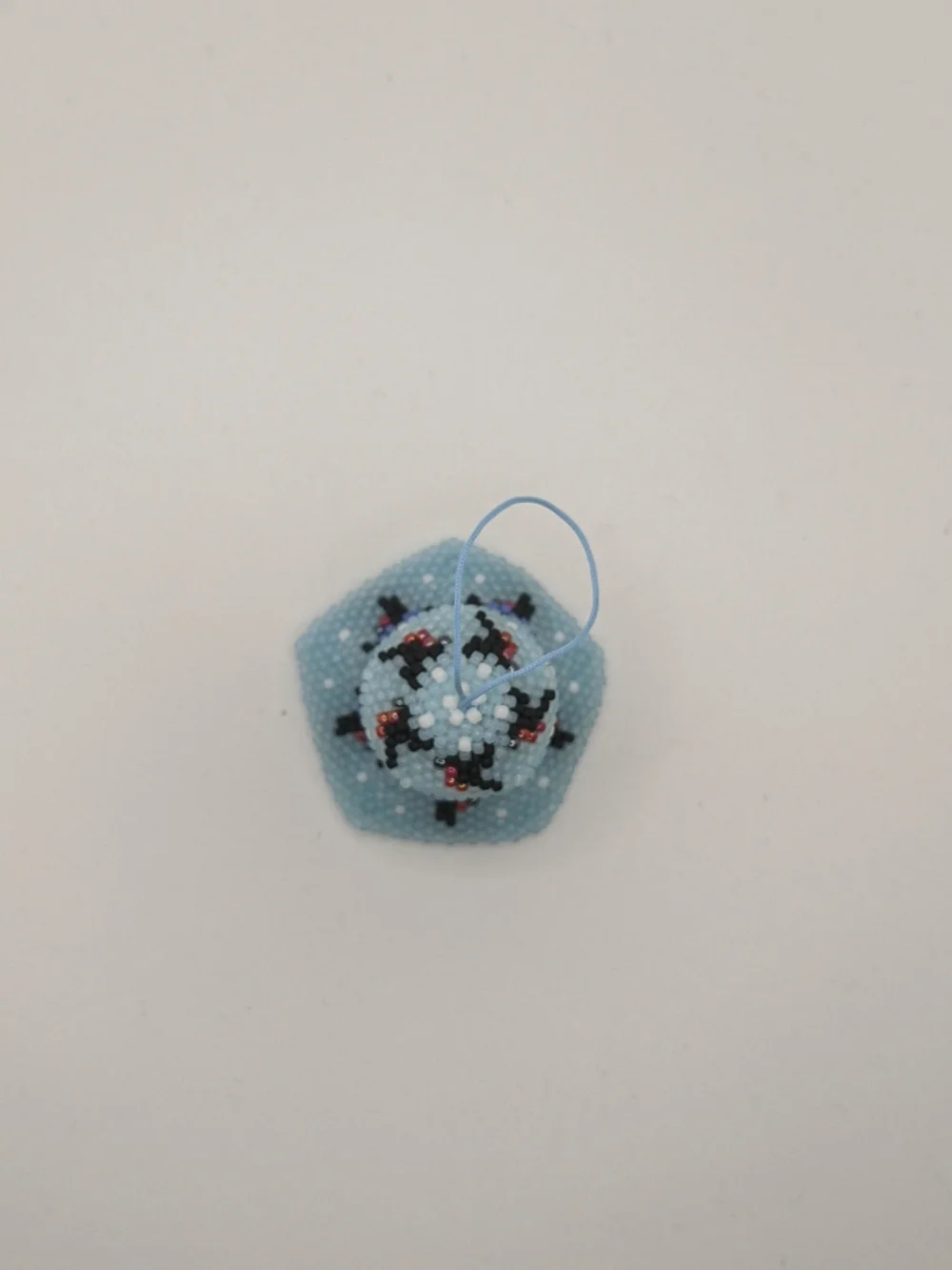 Handcrafted Light Blue Beaded Bell Ornament with Floral Accents